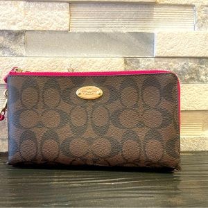 Coach Wristlet Wallet pink and Tan Colors.